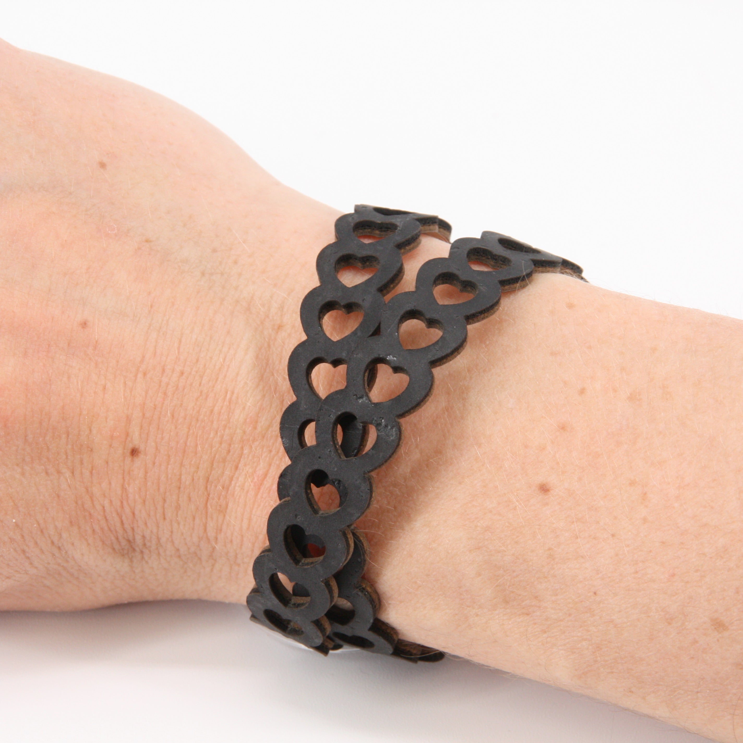 Cork bracelet * small black hearts motif * handmade in Portugal * extremely sustainable * vegan * nickel and lead free